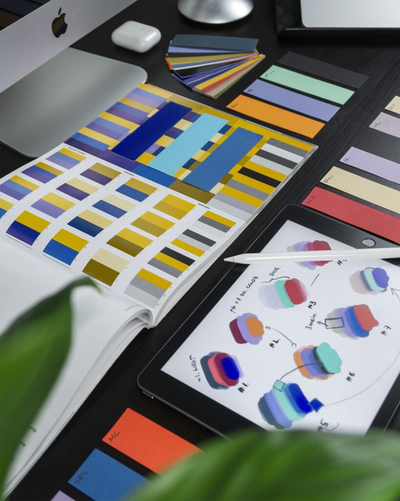UI design wireframes on a desk